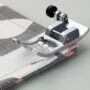 Piedino zigzag con bottone livellamento
